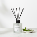 Eucalyptus and Mint Reed Diffuser in frosted glass bottle with black reeds